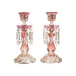 A pair of Baccarat Amberina candlestick lusters