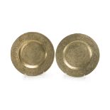 A pair of Chinese brass roundels