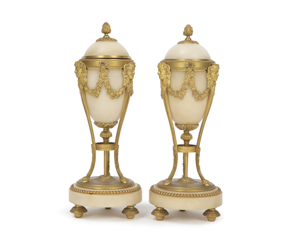 A pair of French gilt bronze-mounted alabaster convertible urns