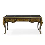 A Louis XV-style gilt bronze bureau plat