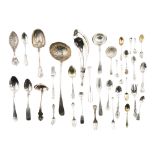 A group of miscellaneous flatware and serving pieces