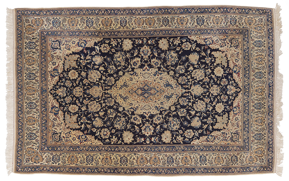 A Kirman hand knotted woolen rug