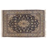 A Kirman hand knotted woolen rug