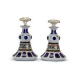 A pair of Bohemian cut glass perfume bottles