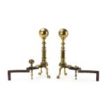 A pair of brass andirons