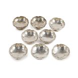 Eight sterling silver salt cellars/nut dishes