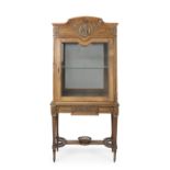 A Louis XVI-style vitrine cabinet