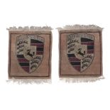 A pair of hand knotted Porsche floor mats