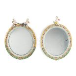 A pair of porcelain roundel mirrors