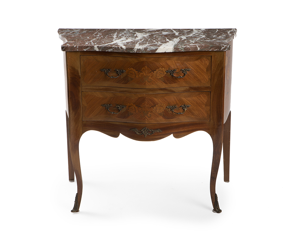 A French Provincial-style side table with marble top