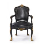 A Louis XV-style gilt bronze-mounted ebonized fauteuil