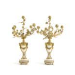 A pair of Louis XVI-style candelabra