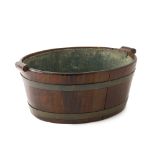 An English Georgian mahogany cistern