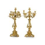 A pair of gilt bronze candelabra