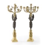 A pair of Empire-style candelabra