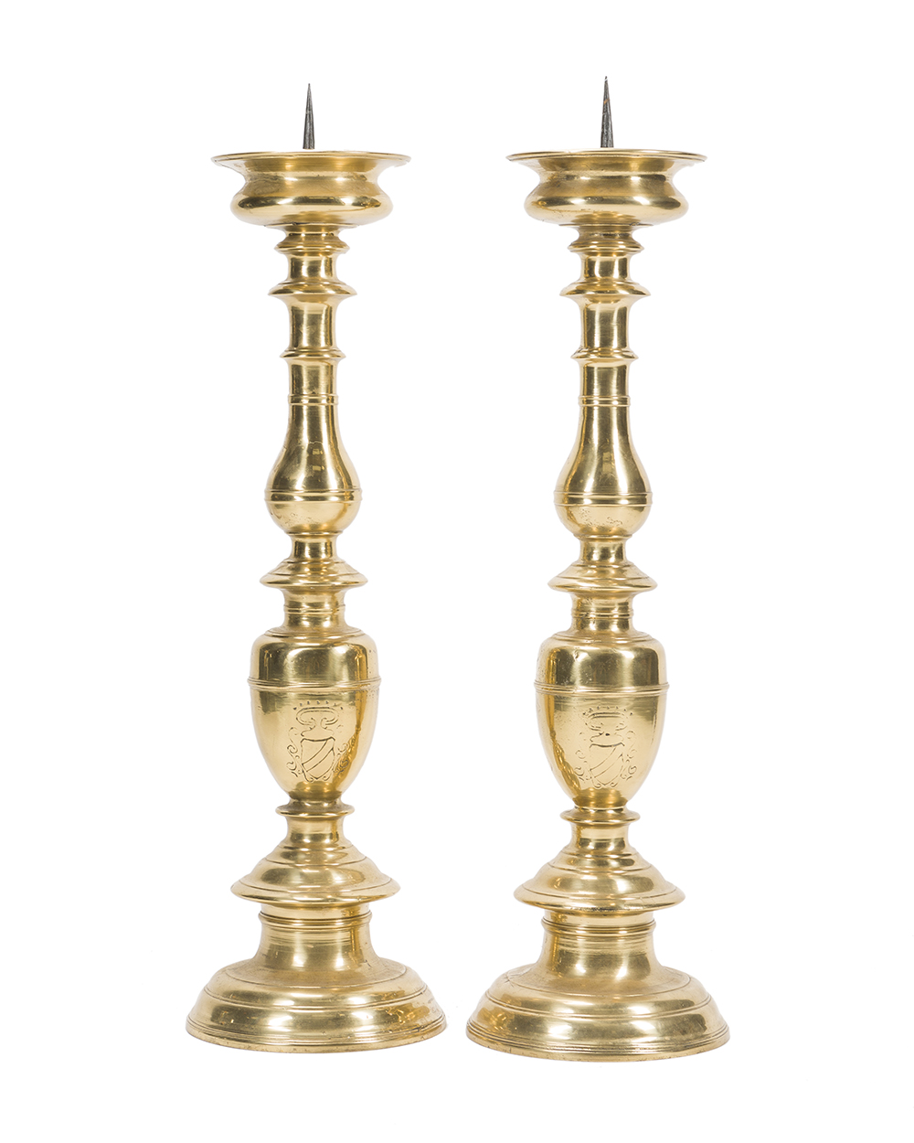 A pair of European brass pricket sticks