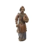 A carved wood biblical figure