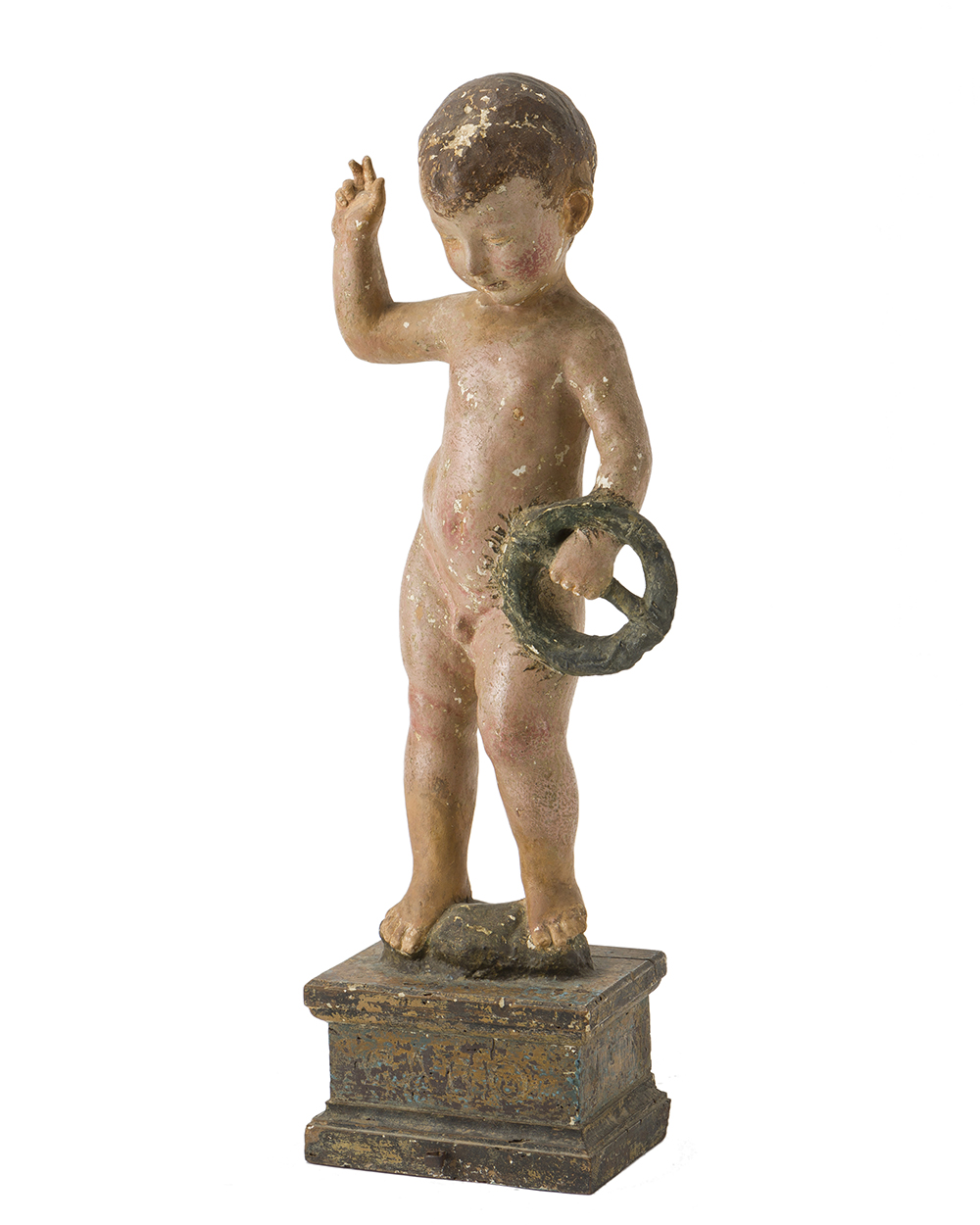 A carved and polychromed figure of the Christ child