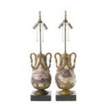 A pair of gilt bronze-mounted marble lamps