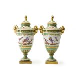 A pair of Vincent Dubois porcelain lidded urns