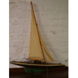 Model pond yacht on stand