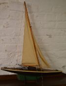 Model pond yacht on stand