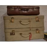 3 vintage suitcases