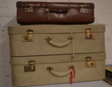 3 vintage suitcases