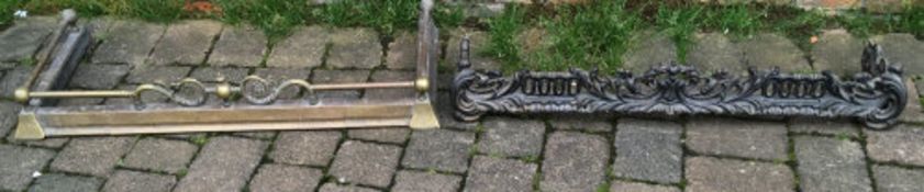 An adjustable brass fender & a Victorian cast iron fender