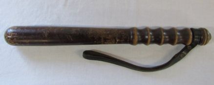 Turned wood police truncheon with leather strap L 39 cm