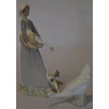 Lladro figure of a girl with goose & dog (previously repaired) and a Nao figure of a goose