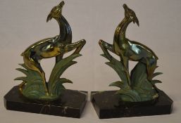 Pair of leaping antelope book ends signed Gallot