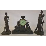 2 bronze effect figures and a figural clock