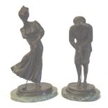 Pair of bronze effect golfing figures