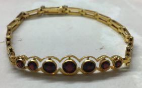 9ct gold and garnet bracelet