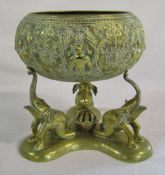 Indian brass bowl resting on 3 elephant form supports H 23 cm