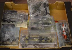 Various Amercom model vehicles including planes and helicopters