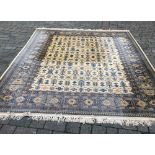 Large Persian pattern carpet 350cm by 251cm