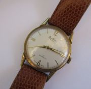 9ct gold gents Bentima Star wrist watch (marked 375) with leather strap and original case and