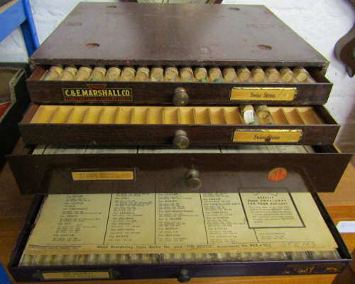 3 small watchmakers cabinets/drawers with contents including staffs and stems