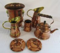 Selection of copper ware inc jugs and kettle