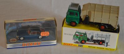 Boxed Dinky Toys 978 'Refuse Wagon' die cast model vehicle (includes 2 trash cans) and a Matchbox