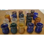 Approx 20 early 20th century coloured glass jars / candle holders (AF)