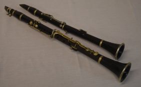 2 old wooden body clarinets