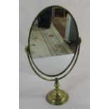 Brass oval mirror on stand H 57 cm