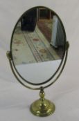 Brass oval mirror on stand H 57 cm