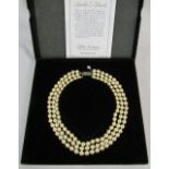 Franklin Mint 'Jackie's pearls' - boxed reproduction of the triple strand faux-pearl necklace owned