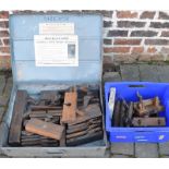 Large quantity of old wooden moulding planes in a Schemuly Pistol Rocket tin case