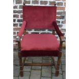 Red velvet open armchair