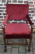 Red velvet open armchair